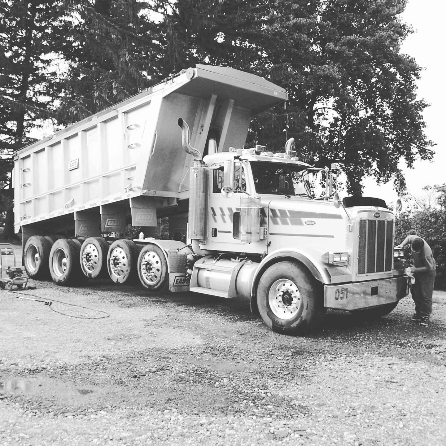Large dump truck being worked on — Bradly Schmul (Missy's Dad)